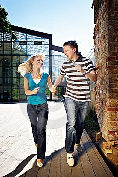 happy-lovers-man-and-woman-run-thumb13467840